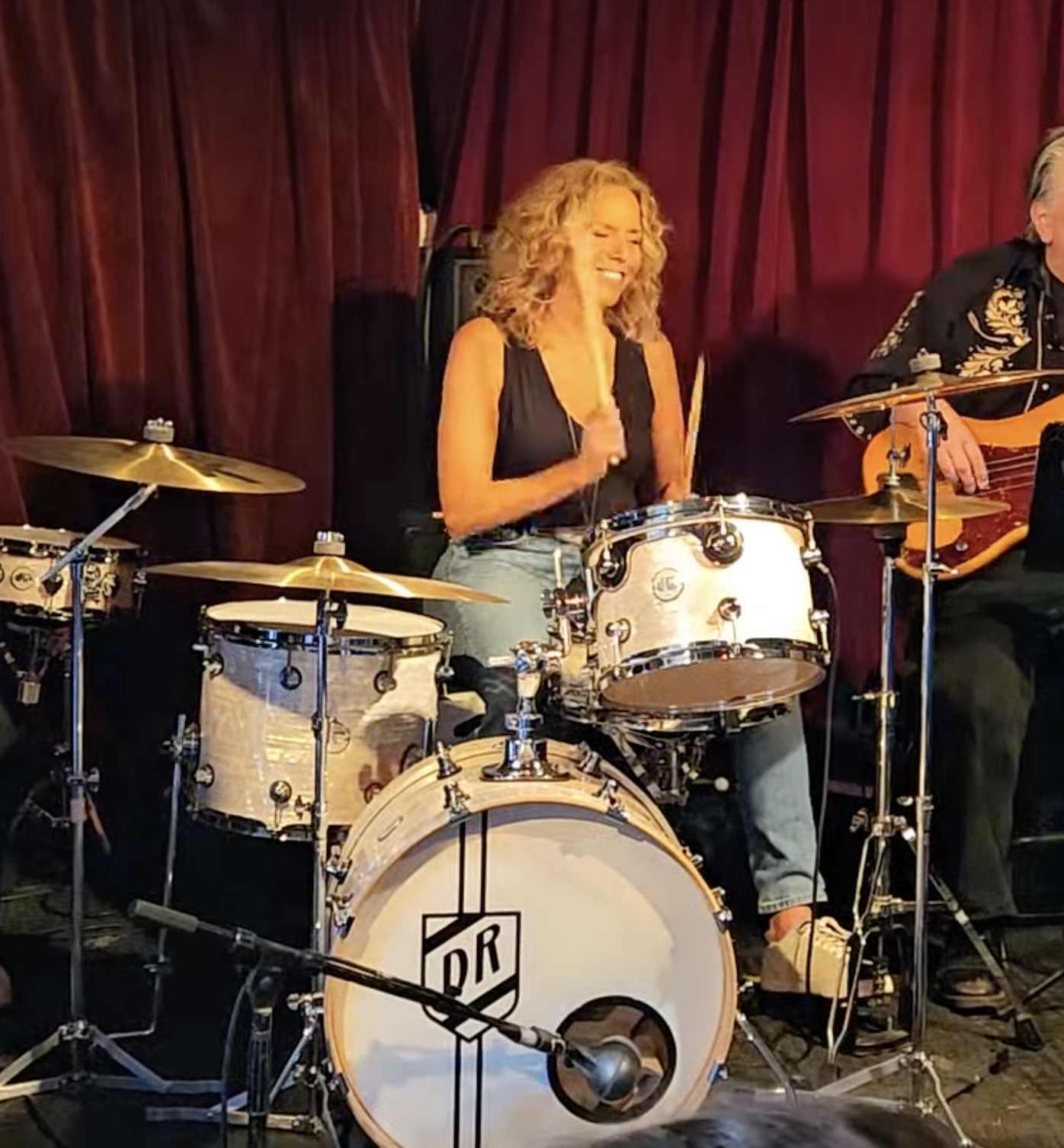 Barbara Zamost playing drums